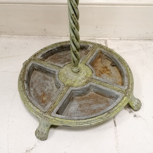 320 - Antique circular green painted cast metal umbrella/stick stand - has losses to the paint otherwise i... 