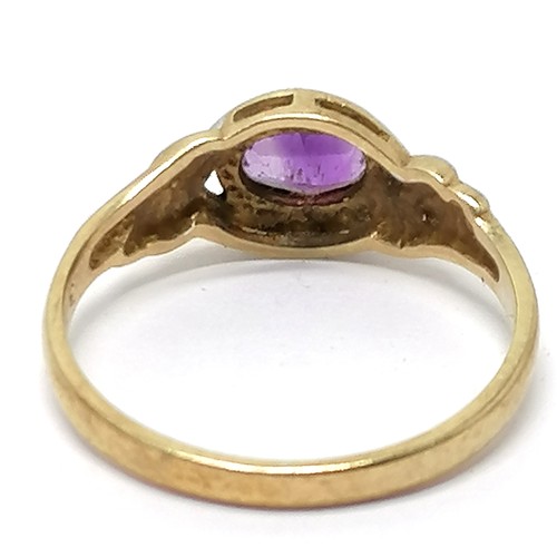 688 - 9ct hallmarked gold amethyst stone set ring with diamond set shoulders - size L & 1.6g total weight