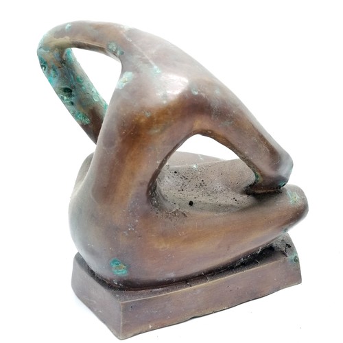 6 - Abstract bronze sculpture of a seated figure with surface verdigris - 25cm high x 23cm across