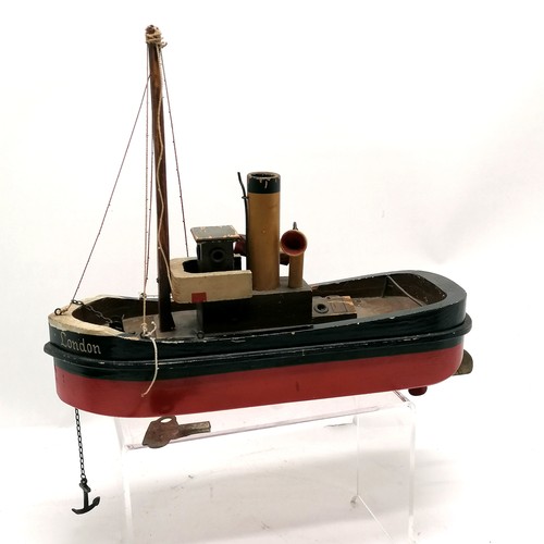 9 - Antique Triang ? clockwork model of a boat retailed by Gamages - 34cm total length x 28cm high (with... 