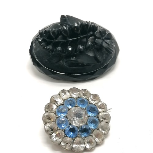 421 - 2 x antique brooches - hand carved jet (4.5cm) & unmarked silver blue / white paste target brooch