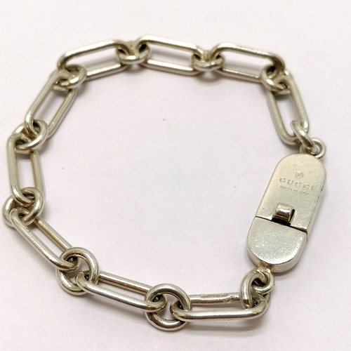 725 - Gucci sterling silver bracelet - 18cm long & 19.8g in used condition and in original retail box - no... 