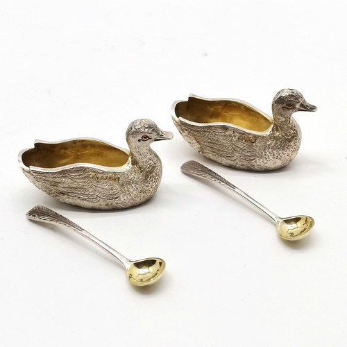 769 - A Haviland-Nye 1972 silver pair of duck salts with original feather detailed spoons and have gilded ... 