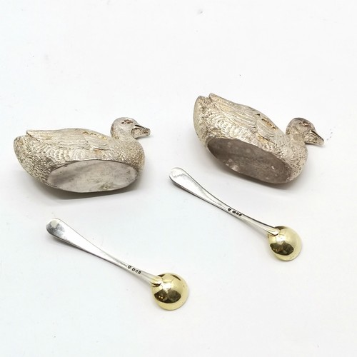 769 - A Haviland-Nye 1972 silver pair of duck salts with original feather detailed spoons and have gilded ... 