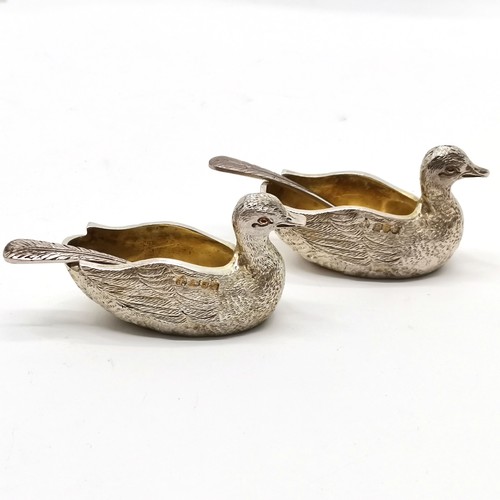 769 - A Haviland-Nye 1972 silver pair of duck salts with original feather detailed spoons and have gilded ... 