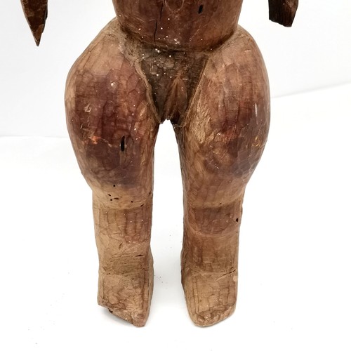 145 - African hand carved wooden ethnic fetish doll with moveable arms 85cm tall & has some losses and shr... 