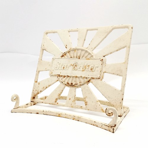 147 - Contemporary cast iron 'Star Baker' cookery book stand - 23cm high x 29cm wide