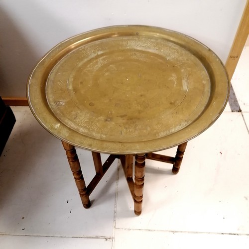 162 - Indian circular brass tray on folding stand 57cm diameter x 48cm high