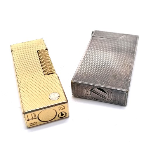 242 - 2 x Dunhill lighters inc gold plated Rollagas ~ the silver plated has a dent