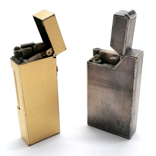 242 - 2 x Dunhill lighters inc gold plated Rollagas ~ the silver plated has a dent