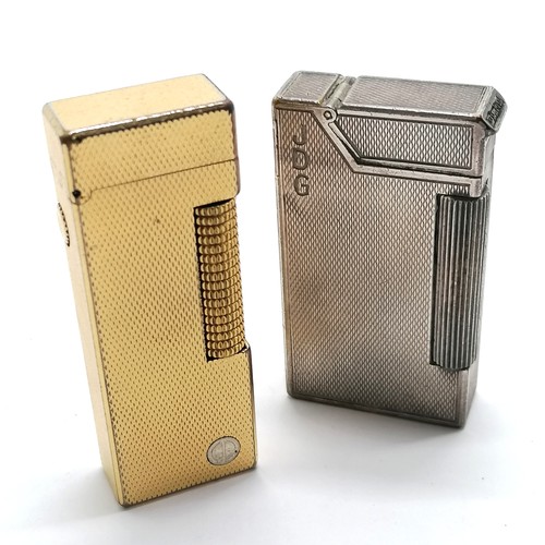 242 - 2 x Dunhill lighters inc gold plated Rollagas ~ the silver plated has a dent