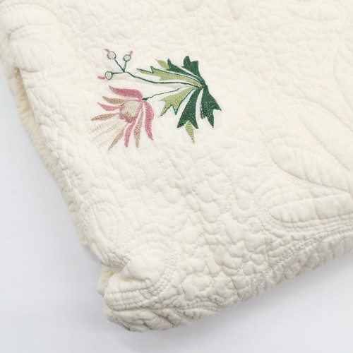 263 - King size cream quilt with stitched floral detail - in good used condition