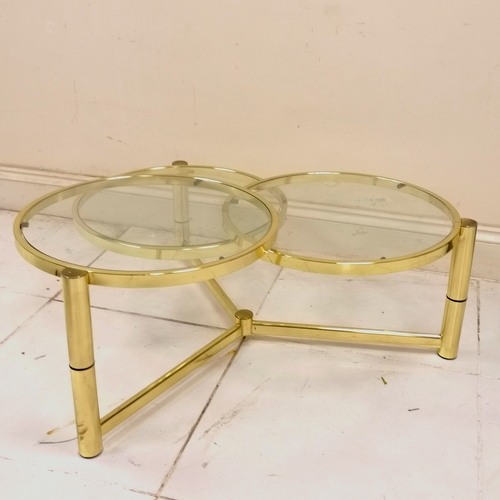 275 - Milo Baughman style 1980's unusual brass triple circular glass topped coffee table with rotating top... 