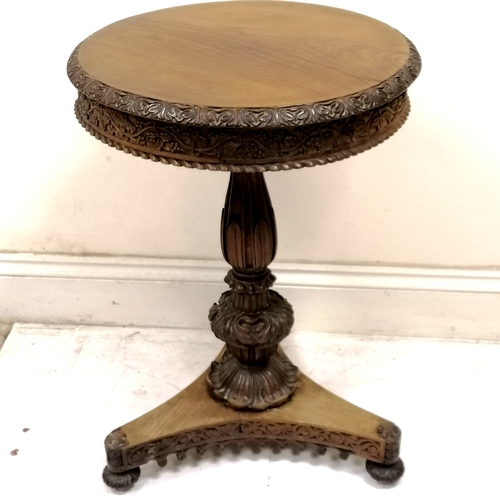 280 - Antique flame mahogany circular pedestal table with carved detail 52cm diameter 76cm high