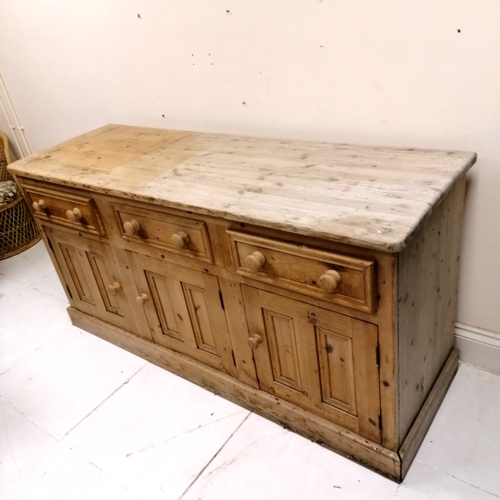 282 - Large pine dresser base with 3 drawers and 3 cupboards 183cm wide 63cm deep 92 high