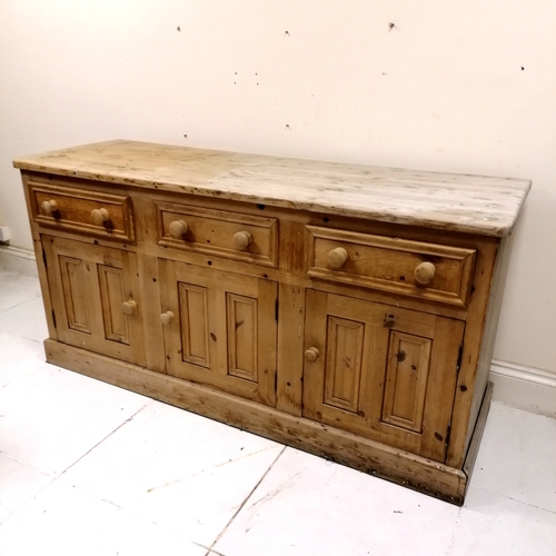 282 - Large pine dresser base with 3 drawers and 3 cupboards 183cm wide 63cm deep 92 high