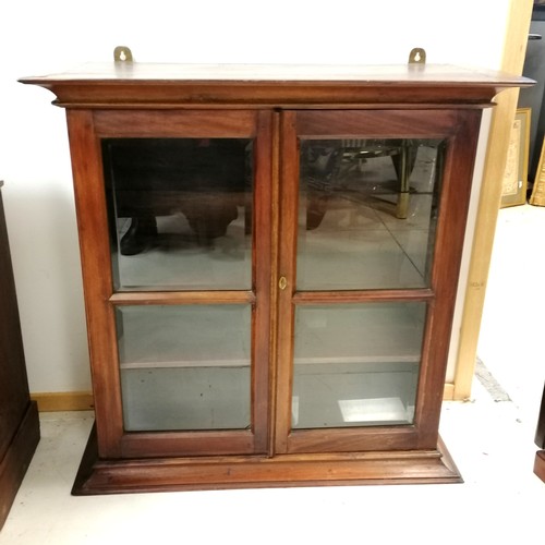 334 - Hardwood 2 door glazed wall cabinet with bevelled edge glass and key 80cm x 80cm x 30cm deep. 1 glaz... 