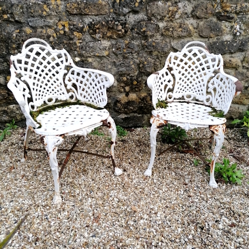 68 - Pair of cast iron garden chairs with lattice detail - 55cm x 45cm x 79cm
