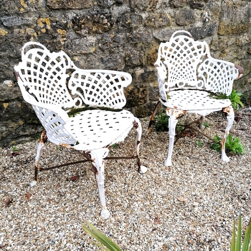 68 - Pair of cast iron garden chairs with lattice detail - 55cm x 45cm x 79cm