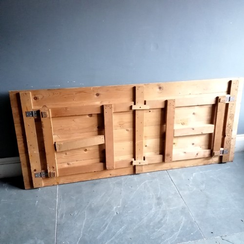 96 - Pine folding trestle table 180cm x 76cm wide