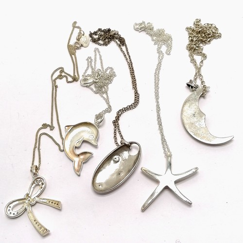604 - 5 x 925 marked pendants on chains inc moon, dolphin etc - total weight (5) 36g