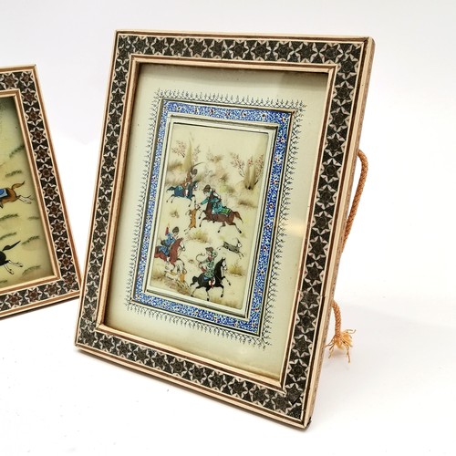 252 - 2 x hand painted Islamic pictures depicting polo & hunting in Persian Khātam frames - largest 23cm x... 
