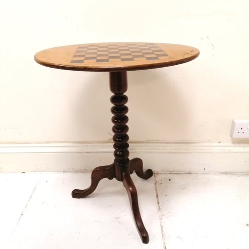 199 - Antique oval mahogany games table on tripod base - 58cm x 43cm x 69cm