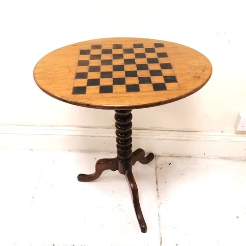 199 - Antique oval mahogany games table on tripod base - 58cm x 43cm x 69cm