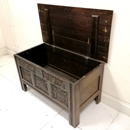 201 - Antique coffer with earlier carved panels dated - 120cm x 61cm x 66cm
