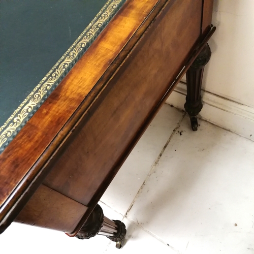 206 - Holland and Sons antique mahogany desk with original green tooled leather top on reeded legs termina... 