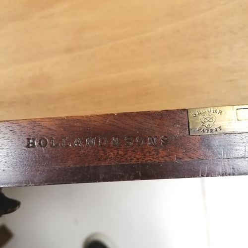 206 - Holland and Sons antique mahogany desk with original green tooled leather top on reeded legs termina... 