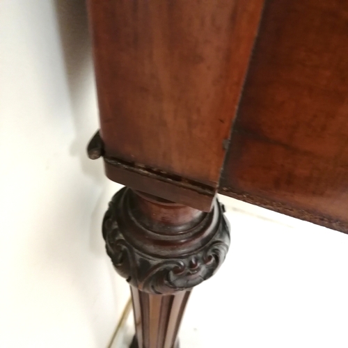 206 - Holland and Sons antique mahogany desk with original green tooled leather top on reeded legs termina... 