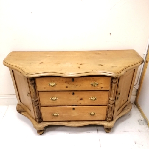 215 - Unusual antique pine sideboard with serpentine front on bun feet - 152cm x 55cm x 85cm