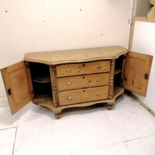 215 - Unusual antique pine sideboard with serpentine front on bun feet - 152cm x 55cm x 85cm