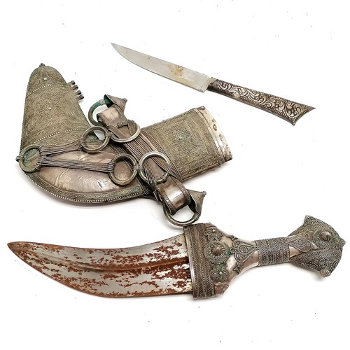 225 - Middle Eastern jambiya with unmarked foreign silver detail - 32cm and rusty blade 17cm long