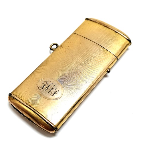 228 - Antique gilt metal vesta case with sunburst design to front - 6.5cm x 2.8cm ~ some wear to gilt fini... 