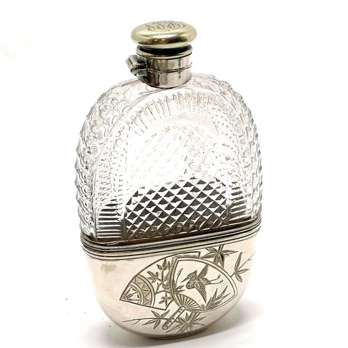 Silver plated aesthetic movement hip flask with deep cut detail to