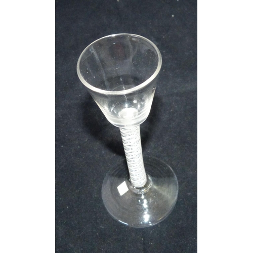 10 - A Georgian Cordial Glass having opaque twist stem on round base, 16cm high