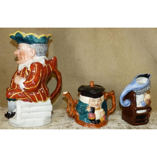 19 - A China Character Jug in form of Punch, 25.5cm high, a small character jug 