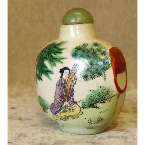 41 - A 19th/20th Century Satsuma Snuff Bottle having painted figure and tree decoration, 7cm high