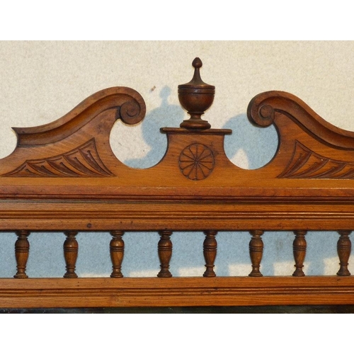 830 - An Oak Hanging Bevelled Overmantle with turned finials and swan neck cornice, 1m 43cm high, 1m 12cm ... 