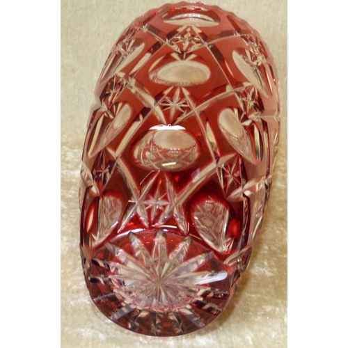 106 - A Ruby and Clear Cut Glass Bulbous Trumpet Shape Vase having thumb pattern rim, 25cm high  