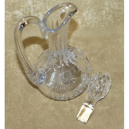 108 - A Heavy Cut Glass Bulbous Thin Neck Claret Jug with stopper having thumb pattern decoration, 30cm hi... 