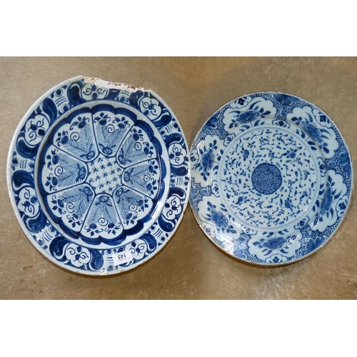 150 - An Antique Delft Round Charger on blue and white ground with floral, leaf and scroll decoration, 34.... 