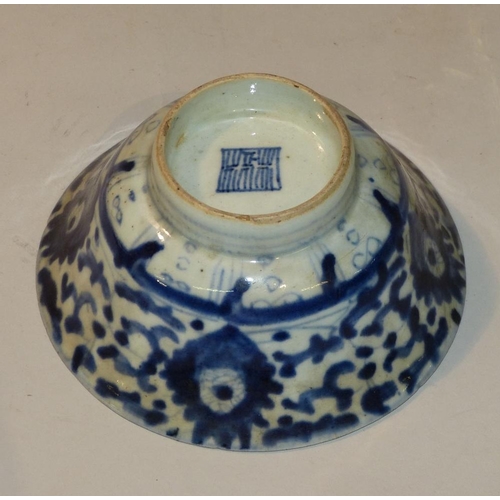 17 - An 18th/19th Century Oriental Round Trumpet Shape Bowl on blue and white ground with floral and scro... 