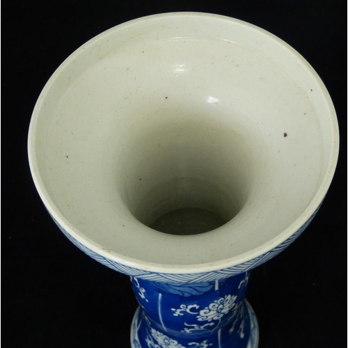 202 - An Oriental Blue and White Round Trumpet Shape Vase having figure, floral and scroll decoration, 23c... 