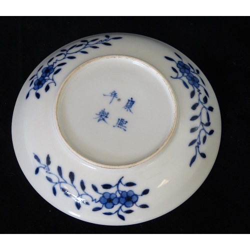 203 - An Oriental Blue and White Round Dish having hunting scene and floral decoration, 14cm diameter   