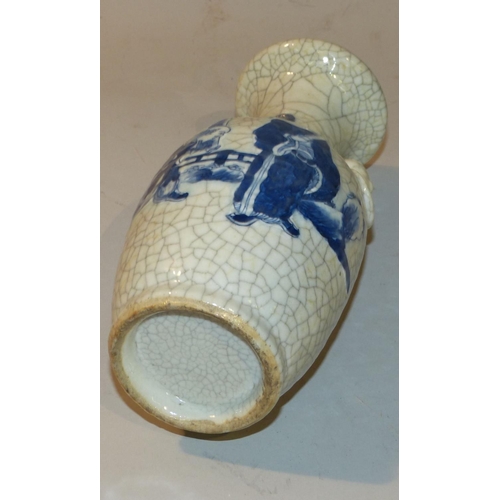 22 - An Oriental Bulbous Thin Neck Trumpet Shape Crackle Ware Vase on blue and white ground having raised... 