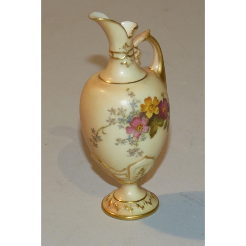 26 - A Royal Worcester Blush Round Thin Neck Small Ewer having hand painted floral, leaf and gilt decorat... 