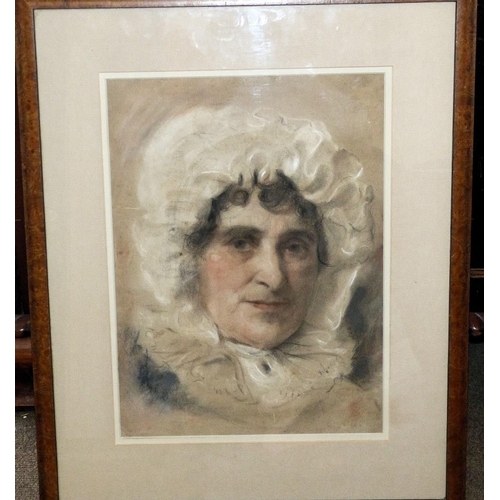 296 - A Pastel Shoulder Length Portrait of an elderly lady in walnut frame, 37cm x 27cm  